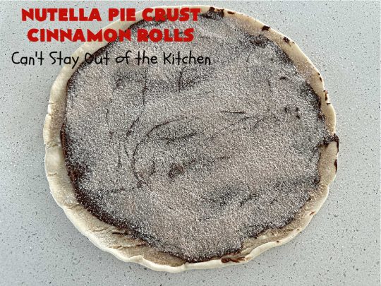 Nutella Pie Crust Cinnamon Rolls | Can't Stay Out of the Kitchen | Enjoy the wonderful flavors of #Nutella & #cinnamon spread on #PieCrust in this easy, #4Ingredient #recipe. Great #breakfast or #brunch #entree for company or #holidays. Or surprise everyone with these #CinnamonRolls at #tailgating parties & #potlucks. Everyone will want seconds! #PieCrustCinnamonRolls #chocolate #NutellaPieCrustCinnamonRolls