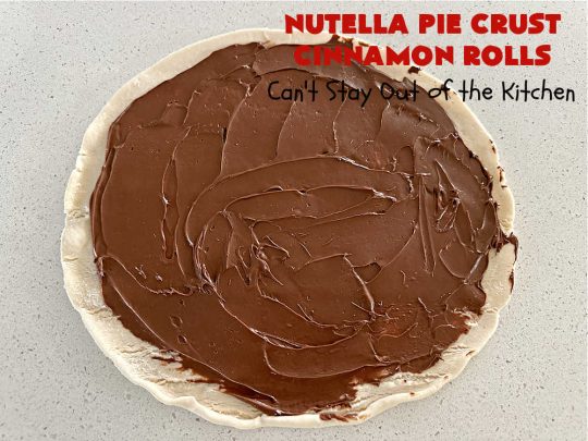 Nutella Pie Crust Cinnamon Rolls | Can't Stay Out of the Kitchen | Enjoy the wonderful flavors of #Nutella & #cinnamon spread on #PieCrust in this easy, #4Ingredient #recipe. Great #breakfast or #brunch #entree for company or #holidays. Or surprise everyone with these #CinnamonRolls at #tailgating parties & #potlucks. Everyone will want seconds! #PieCrustCinnamonRolls #chocolate #NutellaPieCrustCinnamonRolls