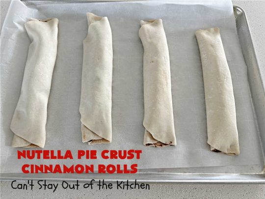 Nutella Pie Crust Cinnamon Rolls | Can't Stay Out of the Kitchen | Enjoy the wonderful flavors of #Nutella & #cinnamon spread on #PieCrust in this easy, #4Ingredient #recipe. Great #breakfast or #brunch #entree for company or #holidays. Or surprise everyone with these #CinnamonRolls at #tailgating parties & #potlucks. Everyone will want seconds! #PieCrustCinnamonRolls #chocolate #NutellaPieCrustCinnamonRolls