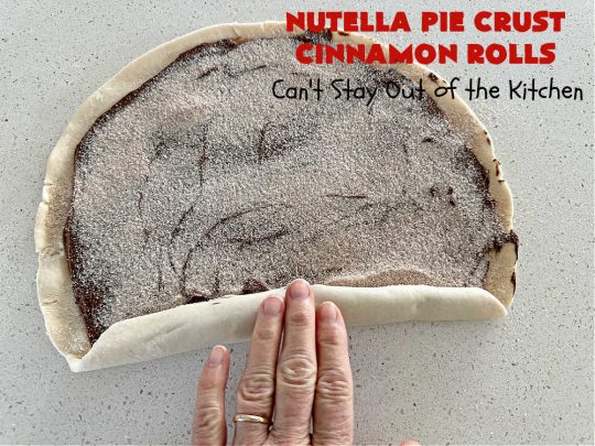 Nutella Pie Crust Cinnamon Rolls | Can't Stay Out of the Kitchen | Enjoy the wonderful flavors of #Nutella & #cinnamon spread on #PieCrust in this easy, #4Ingredient #recipe. Great #breakfast or #brunch #entree for company or #holidays. Or surprise everyone with these #CinnamonRolls at #tailgating parties & #potlucks. Everyone will want seconds! #PieCrustCinnamonRolls #chocolate #NutellaPieCrustCinnamonRolls