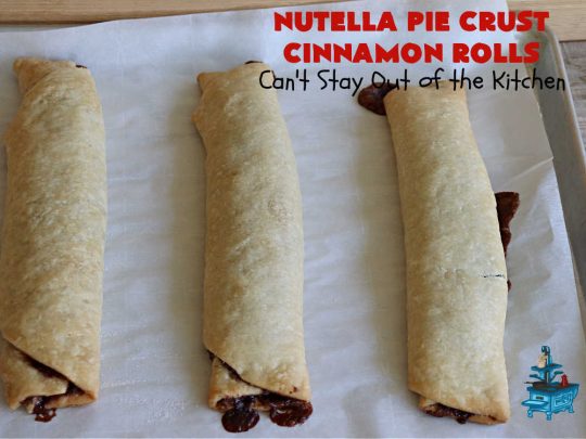 Nutella Pie Crust Cinnamon Rolls | Can't Stay Out of the Kitchen | Enjoy the wonderful flavors of #Nutella & #cinnamon spread on #PieCrust in this easy, #4Ingredient #recipe. Great #breakfast or #brunch #entree for company or #holidays. Or surprise everyone with these #CinnamonRolls at #tailgating parties & #potlucks. Everyone will want seconds! #PieCrustCinnamonRolls #chocolate #NutellaPieCrustCinnamonRolls