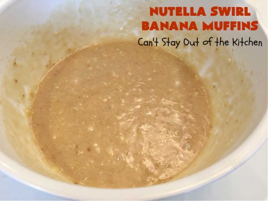 Nutella Swirl Banana Muffins | Can't Stay Out of the Kitchen | these outrageous #muffins are filled with #almonds & #bananas and swirled with #Nutella! These are so heavenly you won't be able to stay out of them. #breakfast #holiday #HolidayBreakfast #NutellaMuffins #NutellaSwirlBananaMuffins