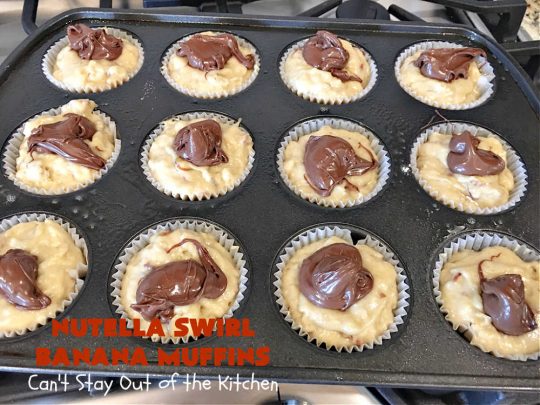 Nutella Swirl Banana Muffins | Can't Stay Out of the Kitchen | these outrageous #muffins are filled with #almonds & #bananas and swirled with #Nutella! These are so heavenly you won't be able to stay out of them. #breakfast #holiday #HolidayBreakfast #NutellaMuffins #NutellaSwirlBananaMuffins