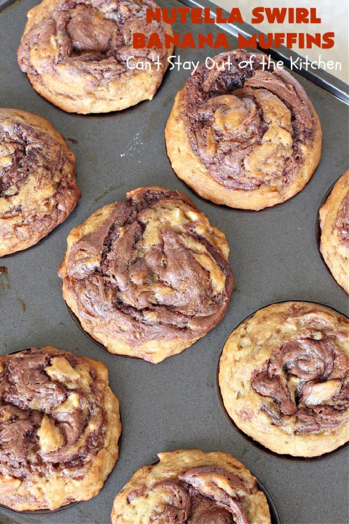 Nutella Swirl Banana Muffins | Can't Stay Out of the Kitchen | these outrageous #muffins are filled with #almonds & #bananas and swirled with #Nutella! These are so heavenly you won't be able to stay out of them. #breakfast #holiday #HolidayBreakfast #NutellaMuffins #NutellaSwirlBananaMuffins