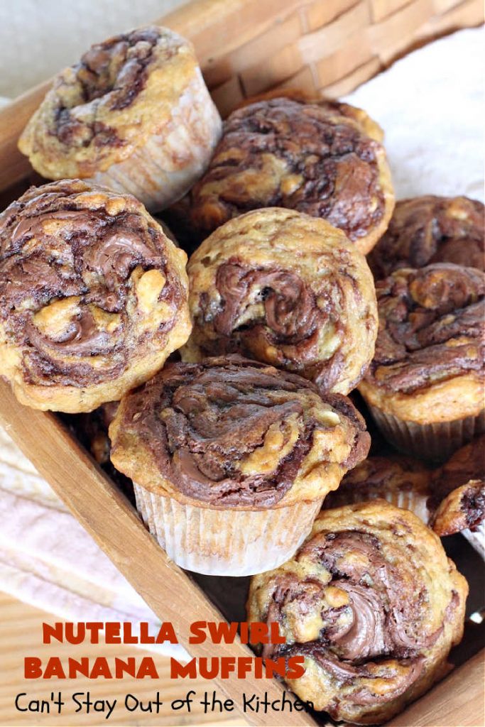 Nutella Swirl Banana Muffins | Can't Stay Out of the Kitchen | these outrageous #muffins are filled with #almonds & #bananas and swirled with #Nutella! These are so heavenly you won't be able to stay out of them. #breakfast #holiday #HolidayBreakfast #NutellaMuffins #NutellaSwirlBananaMuffins