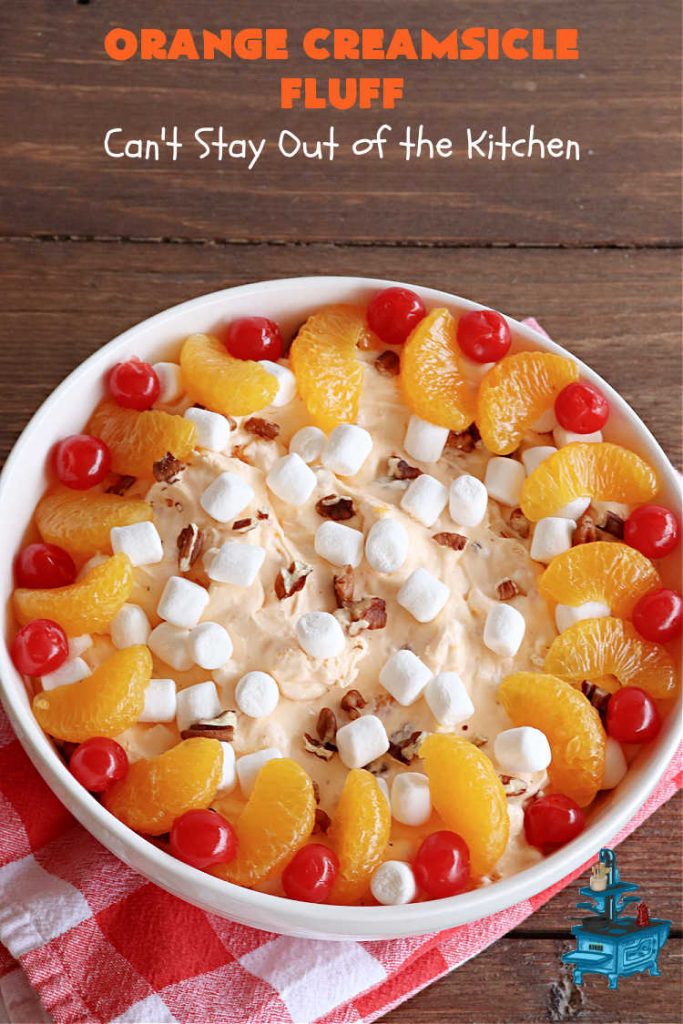 Orange Creamsicle Fluff | Can't Stay Out of the Kitchen | this fluffy #FruitSalad is outrageously good! It's smooth & creamy & tastes like eating #OrangeCreamsicle. #OrangeExtract makes it just pop in flavor. Terrific for company or #holiday dinners like #Easter, #MothersDay or #FathersDay. #pecans #marshmallows #MandarinOranges #MaraschinoCherries #OrangeCreamsicleFluffOrange Creamsicle Fluff | Can't Stay Out of the Kitchen | this fluffy #FruitSalad is outrageously good! It's smooth & creamy & tastes like eating #OrangeCreamsicle. #OrangeExtract makes it just pop in flavor. Terrific for company or #holiday dinners like #Easter, #MothersDay or #FathersDay. #pecans #marshmallows #MandarinOranges #MaraschinoCherries #OrangeCreamsicleFluff