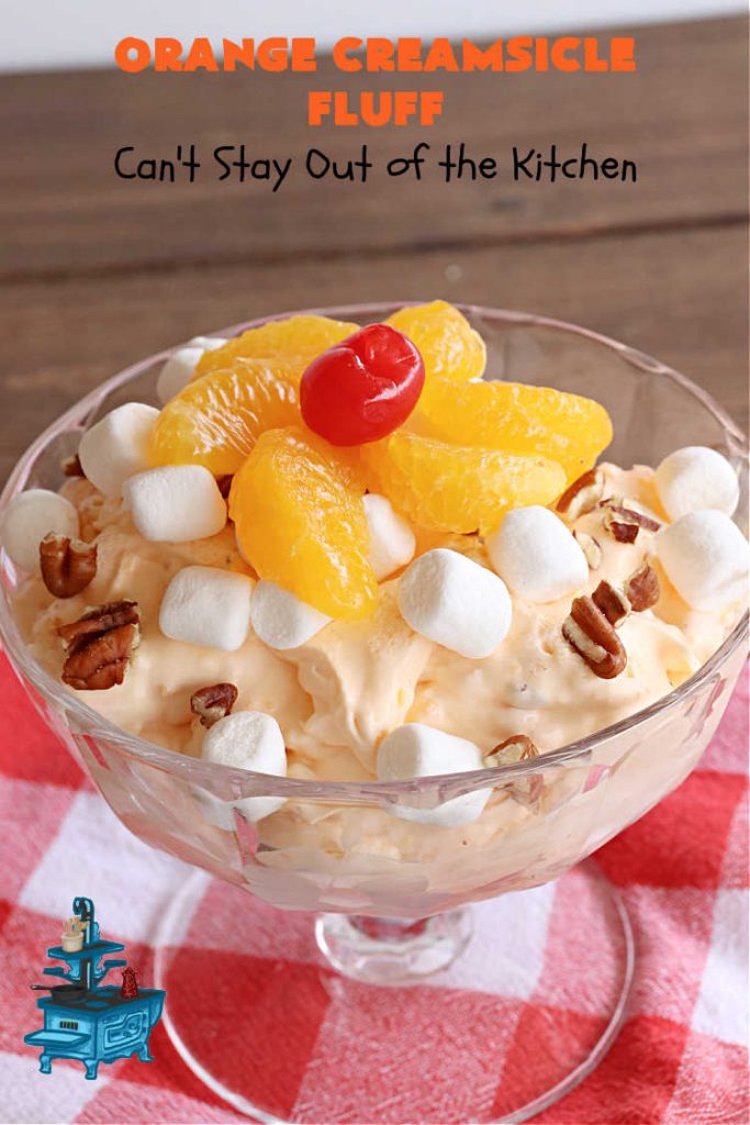 Orange Creamsicle Fluff | Can't Stay Out of the Kitchen | this fluffy #FruitSalad is outrageously good! It's smooth & creamy & tastes like eating #OrangeCreamsicle. #OrangeExtract makes it just pop in flavor. Terrific for company or #holiday dinners like #Easter, #MothersDay or #FathersDay. #pecans #marshmallows #MandarinOranges #MaraschinoCherries #OrangeCreamsicleFluff