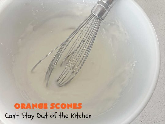 Orange Scones | Can't Stay Out of the Kitchen | these luscious #OrangeScones contain #OrangeJuice & #CandiedOrangePeel in the #scone & more #OJ & #OrangeZest in the icing. They're terrific for #holiday #breakfast or #brunch menus, including #Thanksgiving, #Christmas or #NewYearsDay or any day in between! Softer & sweeter than traditional scones, your family & friends will swoon over these. #orange #HolidayBreakfast #ParadiseFruit