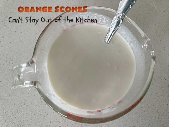 Orange Scones | Can't Stay Out of the Kitchen | these luscious #OrangeScones contain #OrangeJuice & #CandiedOrangePeel in the #scone & more #OJ & #OrangeZest in the icing. They're terrific for #holiday #breakfast or #brunch menus, including #Thanksgiving, #Christmas or #NewYearsDay or any day in between! Softer & sweeter than traditional scones, your family & friends will swoon over these. #orange #HolidayBreakfast #ParadiseFruit