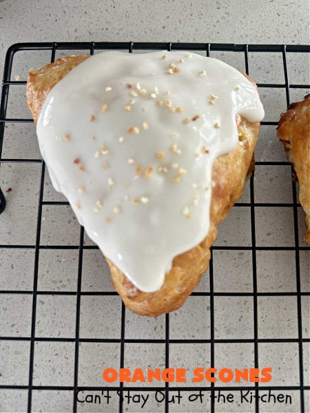 Orange Scones | Can't Stay Out of the Kitchen | these luscious #OrangeScones contain #OrangeJuice & #CandiedOrangePeel in the #scone & more #OJ & #OrangeZest in the icing. They're terrific for #holiday #breakfast or #brunch menus, including #Thanksgiving, #Christmas or #NewYearsDay or any day in between! Softer & sweeter than traditional scones, your family & friends will swoon over these. #orange #HolidayBreakfast #ParadiseFruit