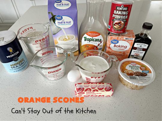 Orange Scones | Can't Stay Out of the Kitchen | these luscious #OrangeScones contain #OrangeJuice & #CandiedOrangePeel in the #scone & more #OJ & #OrangeZest in the icing. They're terrific for #holiday #breakfast or #brunch menus, including #Thanksgiving, #Christmas or #NewYearsDay or any day in between! Softer & sweeter than traditional scones, your family & friends will swoon over these. #orange #HolidayBreakfast #ParadiseFruit