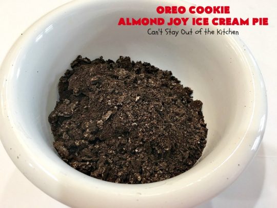 Oreo Cookie Almond Joy Ice Cream Pie | Can't Stay Out of the Kitchen | Wow your family and friends with this spectacular #IceCreamPie for #MothersDay! It combines the best of #Oreos with #AlmondJoyBars! Plus, it's a super easy 5-ingredient #dessert to die for! #Holiday #Pie #HolidayDessert #ChocolateDessert #OreoDessert #AlmondJoyDessert #ChocolatePie #OreoPie #IceCream #AlmondJoyPie #OreoCookieAlmondJoyIceCreamPie