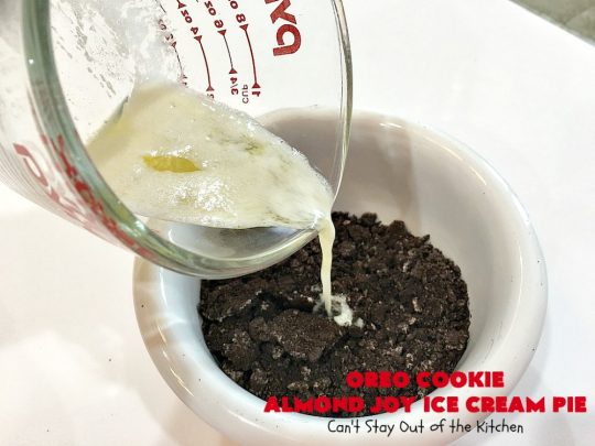 Oreo Cookie Almond Joy Ice Cream Pie | Can't Stay Out of the Kitchen | Wow your family and friends with this spectacular #IceCreamPie for #MothersDay! It combines the best of #Oreos with #AlmondJoyBars! Plus, it's a super easy 5-ingredient #dessert to die for! #Holiday #Pie #HolidayDessert #ChocolateDessert #OreoDessert #AlmondJoyDessert #ChocolatePie #OreoPie #IceCream #AlmondJoyPie #OreoCookieAlmondJoyIceCreamPie