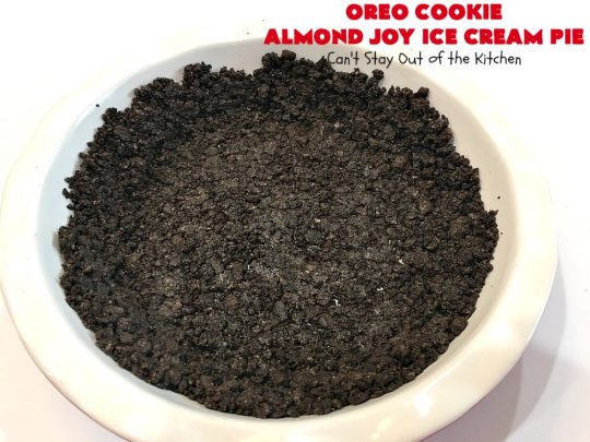 Oreo Cookie Almond Joy Ice Cream Pie | Can't Stay Out of the Kitchen | Wow your family and friends with this spectacular #IceCreamPie for #MothersDay! It combines the best of #Oreos with #AlmondJoyBars! Plus, it's a super easy 5-ingredient #dessert to die for! #Holiday #Pie #HolidayDessert #ChocolateDessert #OreoDessert #AlmondJoyDessert #ChocolatePie #OreoPie #IceCream #AlmondJoyPie #OreoCookieAlmondJoyIceCreamPie
