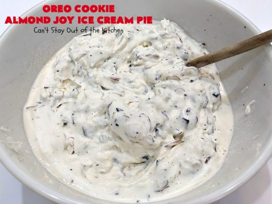 Oreo Cookie Almond Joy Ice Cream Pie | Can't Stay Out of the Kitchen | Wow your family and friends with this spectacular #IceCreamPie for #MothersDay! It combines the best of #Oreos with #AlmondJoyBars! Plus, it's a super easy 5-ingredient #dessert to die for! #Holiday #Pie #HolidayDessert #ChocolateDessert #OreoDessert #AlmondJoyDessert #ChocolatePie #OreoPie #IceCream #AlmondJoyPie #OreoCookieAlmondJoyIceCreamPie