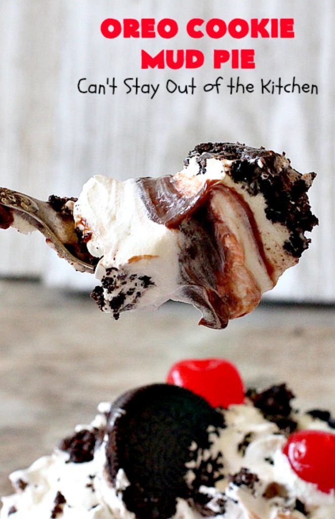 Oreo Cookie Mud Pie | Can't Stay Out of the Kitchen | this spectacular layered #dessert has an #Oreo crust, a #cheesecake layer, a #chocolate #pudding layer, and a #CoolWhip layer with #maraschinocherries. This amazing dessert is always raved over whenever I make it! #chocolatedessert #OreoDessert