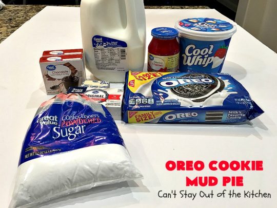 Oreo Cookie Mud Pie | Can't Stay Out of the Kitchen | this spectacular layered #dessert has an #Oreo crust, a #cheesecake layer, a #chocolate #pudding layer, and a #CoolWhip layer with #maraschinocherries. This amazing dessert is always raved over whenever I make it! #chocolatedessert #OreoDessert