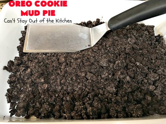 Oreo Cookie Mud Pie | Can't Stay Out of the Kitchen | this spectacular layered #dessert has an #Oreo crust, a #cheesecake layer, a #chocolate #pudding layer, and a #CoolWhip layer with #maraschinocherries. This amazing dessert is always raved over whenever I make it! #chocolatedessert #OreoDessert