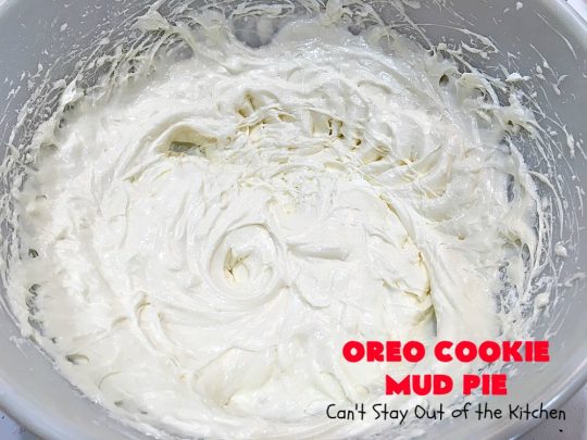Oreo Cookie Mud Pie | Can't Stay Out of the Kitchen | this spectacular layered #dessert has an #Oreo crust, a #cheesecake layer, a #chocolate #pudding layer, and a #CoolWhip layer with #maraschinocherries. This amazing dessert is always raved over whenever I make it! #chocolatedessert #OreoDessert