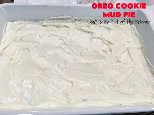 Oreo Cookie Mud Pie | Can't Stay Out of the Kitchen | this spectacular layered #dessert has an #Oreo crust, a #cheesecake layer, a #chocolate #pudding layer, and a #CoolWhip layer with #maraschinocherries. This amazing dessert is always raved over whenever I make it! #chocolatedessert #OreoDessert
