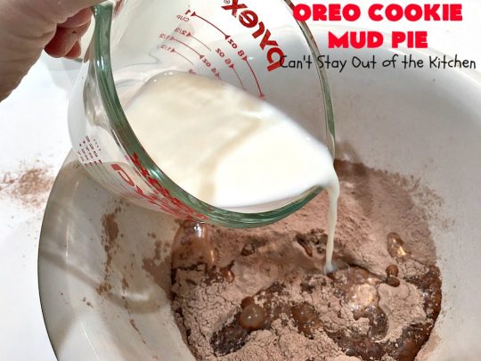 Oreo Cookie Mud Pie | Can't Stay Out of the Kitchen | this spectacular layered #dessert has an #Oreo crust, a #cheesecake layer, a #chocolate #pudding layer, and a #CoolWhip layer with #maraschinocherries. This amazing dessert is always raved over whenever I make it! #chocolatedessert #OreoDessert