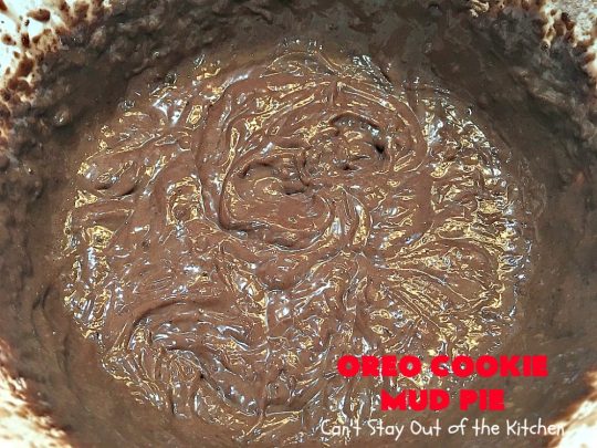 Oreo Cookie Mud Pie | Can't Stay Out of the Kitchen | this spectacular layered #dessert has an #Oreo crust, a #cheesecake layer, a #chocolate #pudding layer, and a #CoolWhip layer with #maraschinocherries. This amazing dessert is always raved over whenever I make it! #chocolatedessert #OreoDessert