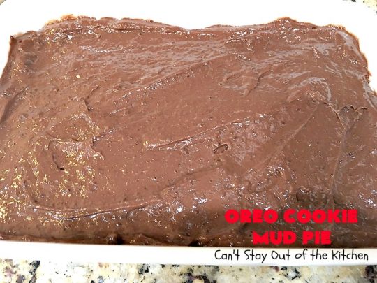 Oreo Cookie Mud Pie | Can't Stay Out of the Kitchen | this spectacular layered #dessert has an #Oreo crust, a #cheesecake layer, a #chocolate #pudding layer, and a #CoolWhip layer with #maraschinocherries. This amazing dessert is always raved over whenever I make it! #chocolatedessert #OreoDessert