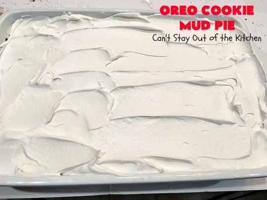 Oreo Cookie Mud Pie | Can't Stay Out of the Kitchen | this spectacular layered #dessert has an #Oreo crust, a #cheesecake layer, a #chocolate #pudding layer, and a #CoolWhip layer with #maraschinocherries. This amazing dessert is always raved over whenever I make it! #chocolatedessert #OreoDessert