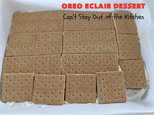Oreo Éclair Dessert | Can't Stay Out of the Kitchen | This is the ultimate in a luscious, drool-worthy #dessert. It tastes like eating #Éclairs with #Oreos in them yet uses only 6 ingredients! It's topped with a delightful #CreamCheese icing that increases the flavor even more. Top with more #OreoCookies & #MaraschinoCherries for a festive & beautiful company or HolidayDessert that everyone will swoon over! #OreoÉclairDessert