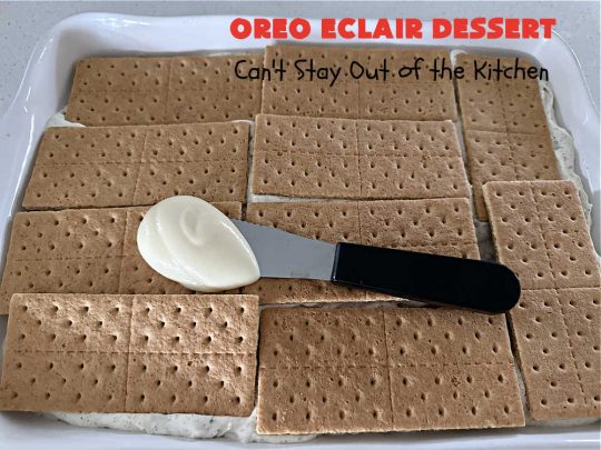 Oreo Éclair Dessert | Can't Stay Out of the Kitchen | This is the ultimate in a luscious, drool-worthy #dessert. It tastes like eating #Éclairs with #Oreos in them yet uses only 6 ingredients! It's topped with a delightful #CreamCheese icing that increases the flavor even more. Top with more #OreoCookies & #MaraschinoCherries for a festive & beautiful company or HolidayDessert that everyone will swoon over! #OreoÉclairDessert