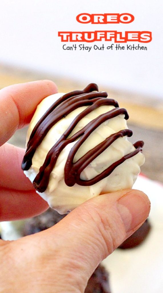Oreo Truffles | Can't Stay Out of the Kitchen | Oh my gosh, heavenly doesn't begin to describe these amazing #truffles. Made with #Oreos, #creamcheese & #chocolate & vanilla bark. Fabulous for any party. #dessert