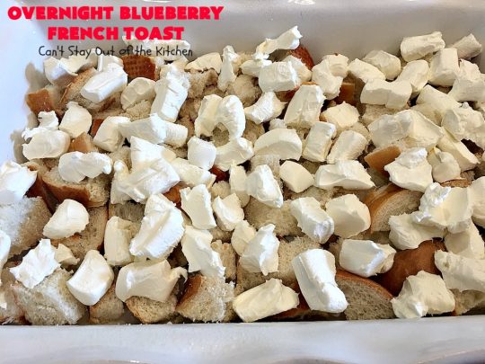 Overnight Blueberry French Toast | Can't Stay Out of the Kitchen | this amazing #FrenchToast is the most awesome decadent #breakfast #casserole you'll ever eat. It's loaded with #blueberries & cream cheese & served with homemade #blueberry sauce. Perfect for #MothersDay, #FathersDay or other #holiday breakfasts.