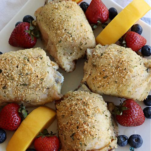 Parmesan Chicken Thigh Bake | Can't Stay Out of the Kitchen | this delicious #chicken #entree can be oven-ready in about 5 minutes. It's quick & easy for a week-night dinner but also nice enough for company. Great way to use #ChickenThighs #ChickenThighs too. #ParmesanCheese #parsley #thyme #GlutenFree #ParmesanChickenThighBake