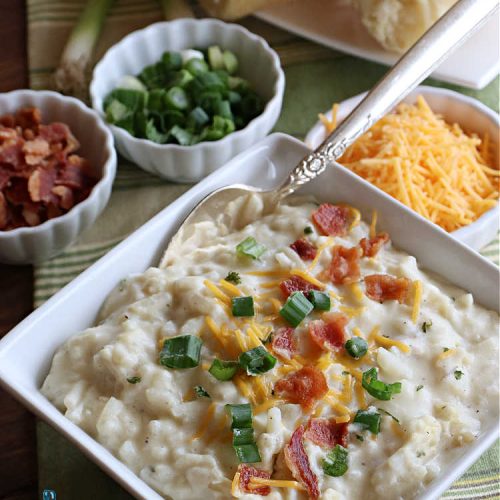 Paula Deen's Crockpot Potato Soup | Can't Stay Out of the Kitchen | this amazing #PotatoSoup #recipe uses frozen #HashBrowns, #CreamCheese & #CreamOfChickenSoup. It's topped off with #bacon, #CheddarCheese & #GreenOnions for amped-up flavor. Since it's made in the #SlowCooker, it's easy peasy too! Great for #tailgating. #soup #PaulaDeen #PaulaDeensCrockpotPotatoSoup