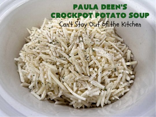 Paula Deen's Crockpot Potato Soup | Can't Stay Out of the Kitchen | this amazing #PotatoSoup #recipe uses frozen #HashBrowns, #CreamCheese & #CreamOfChickenSoup. It's topped off with #bacon, #CheddarCheese & #GreenOnions for amped-up flavor. Since it's made in the #SlowCooker, it's easy peasy too! Great for #tailgating. #soup #PaulaDeen #PaulaDeensCrockpotPotatoSoup