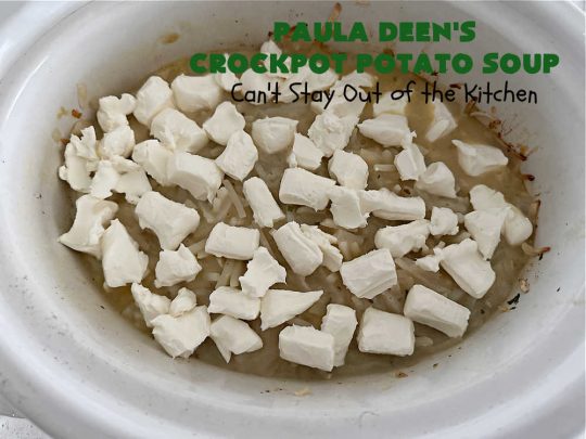 Paula Deen's Crockpot Potato Soup | Can't Stay Out of the Kitchen | this amazing #PotatoSoup #recipe uses frozen #HashBrowns, #CreamCheese & #CreamOfChickenSoup. It's topped off with #bacon, #CheddarCheese & #GreenOnions for amped-up flavor. Since it's made in the #SlowCooker, it's easy peasy too! Great for #tailgating. #soup #PaulaDeen #PaulaDeensCrockpotPotatoSoup