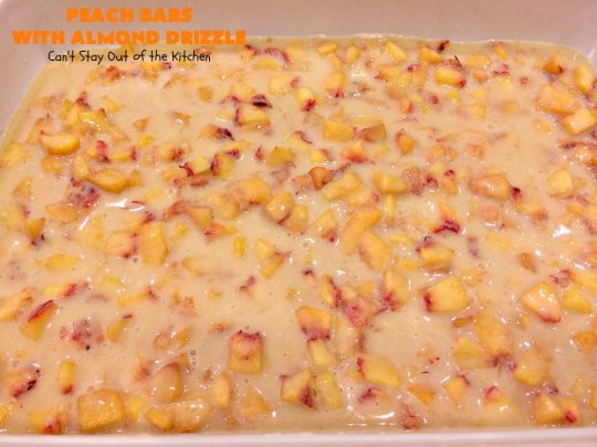 Peach Bars with Almond Drizzle | Can't Stay Out of the Kitchen | this heavenly #dessert uses fresh #peaches, has a streusel topping & glazed with #almond icing. Perfect #dessert for #LaborDay or other summer holidays. 