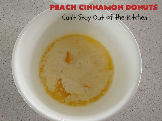 Peach Cinnamon Donuts | Can't Stay Out of the Kitchen | these scrumptious #donuts are so rich & decadent it's like eating #dessert! They're filled with fresh #peaches, #cinnamon & #CinnamonChips & then dipped in a #CinnamonSugar mixture. Fabulous for a weekend, company or #holiday #breakfast. #HolidayBreakfast #PeachCinnamonDonuts