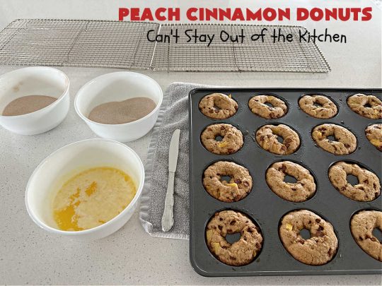 Peach Cinnamon Donuts | Can't Stay Out of the Kitchen | these scrumptious #donuts are so rich & decadent it's like eating #dessert! They're filled with fresh #peaches, #cinnamon & #CinnamonChips & then dipped in a #CinnamonSugar mixture. Fabulous for a weekend, company or #holiday #breakfast. #HolidayBreakfast #PeachCinnamonDonuts