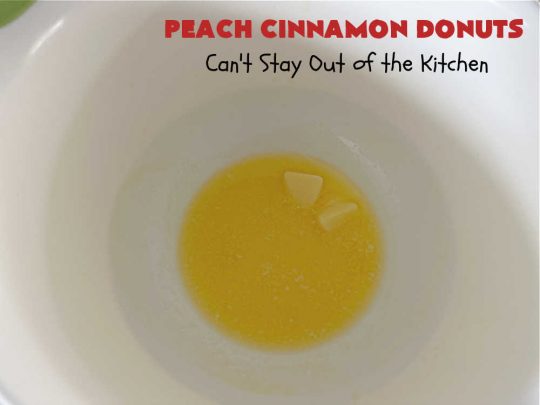 Peach Cinnamon Donuts | Can't Stay Out of the Kitchen | these scrumptious #donuts are so rich & decadent it's like eating #dessert! They're filled with fresh #peaches, #cinnamon & #CinnamonChips & then dipped in a #CinnamonSugar mixture. Fabulous for a weekend, company or #holiday #breakfast. #HolidayBreakfast #PeachCinnamonDonuts
