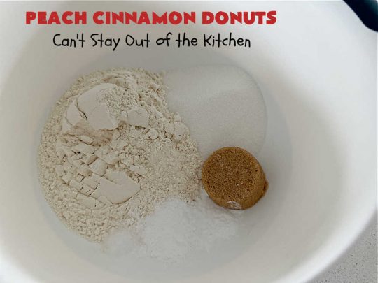 Peach Cinnamon Donuts | Can't Stay Out of the Kitchen | these scrumptious #donuts are so rich & decadent it's like eating #dessert! They're filled with fresh #peaches, #cinnamon & #CinnamonChips & then dipped in a #CinnamonSugar mixture. Fabulous for a weekend, company or #holiday #breakfast. #HolidayBreakfast #PeachCinnamonDonuts
