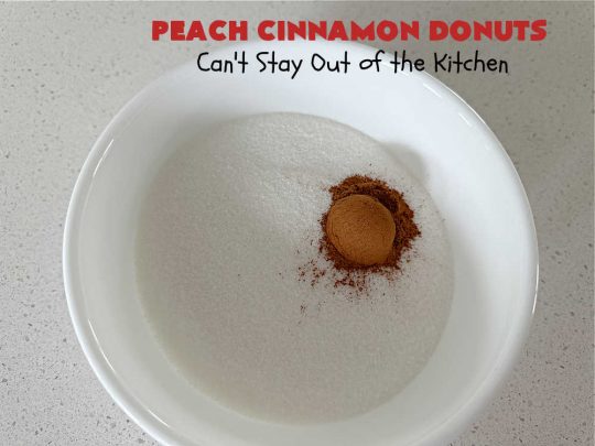 Peach Cinnamon Donuts | Can't Stay Out of the Kitchen | these scrumptious #donuts are so rich & decadent it's like eating #dessert! They're filled with fresh #peaches, #cinnamon & #CinnamonChips & then dipped in a #CinnamonSugar mixture. Fabulous for a weekend, company or #holiday #breakfast. #HolidayBreakfast #PeachCinnamonDonuts