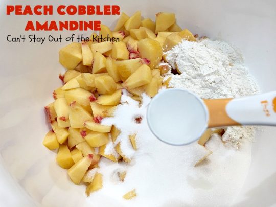 Peach Cobbler Amandine | Can't Stay Out of the Kitchen | this delightful #PeachCobbler #recipe uses #almonds, almond extract & almond meal to really bump up the flavors. It's a scrumptious #dessert to make with fresh #peaches. #PeachDessert #PeachCobblerAmandine #Canbassador #WashingtonStateFruitCommission #WashingtonStoneFruitGrowers #WashingtonStateStoneFruitGrowers