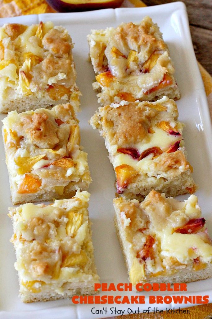 Peach Cobbler Cheesecake Brownies | Can't Stay Out of the Kitchen | these spectacular #brownies start with a #peachcobbler #cookie dough. They have a luscious #cheesecake filling in the middle, topped with fresh #peaches. Then more cookie dough is crumbled over top. These were a huge hit at my husband's office. #dessert #peachdessert #CANbassador #WashingtonStateFruitCommission #WashingtonStatestoneFruitGrowers