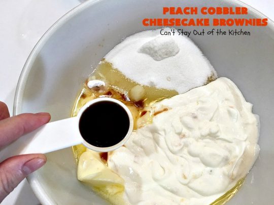 Peach Cobbler Cheesecake Brownies | Can't Stay Out of the Kitchen | these spectacular #brownies start with a #peachcobbler #cookie dough. They have a luscious #cheesecake filling in the middle, topped with fresh #peaches. Then more cookie dough is crumbled over top. These were a huge hit at my husband's office. #dessert #peachdessert #CANbassador #WashingtonStateFruitCommission #WashingtonStatestoneFruitGrowers