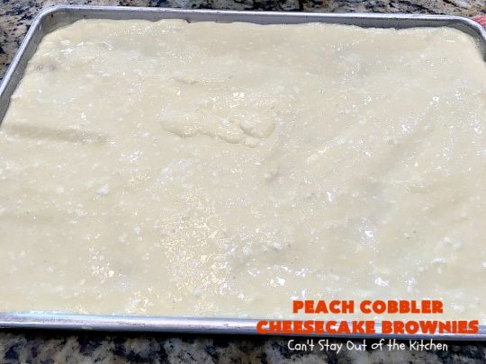 Peach Cobbler Cheesecake Brownies | Can't Stay Out of the Kitchen | these spectacular #brownies start with a #peachcobbler #cookie dough. They have a luscious #cheesecake filling in the middle, topped with fresh #peaches. Then more cookie dough is crumbled over top. These were a huge hit at my husband's office. #dessert #peachdessert #CANbassador #WashingtonStateFruitCommission #WashingtonStatestoneFruitGrowers