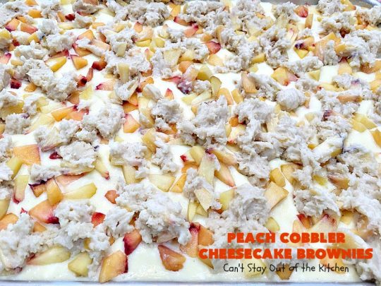 Peach Cobbler Cheesecake Brownies | Can't Stay Out of the Kitchen | these spectacular #brownies start with a #peachcobbler #cookie dough. They have a luscious #cheesecake filling in the middle, topped with fresh #peaches. Then more cookie dough is crumbled over top. These were a huge hit at my husband's office. #dessert #peachdessert #CANbassador #WashingtonStateFruitCommission #WashingtonStatestoneFruitGrowers
