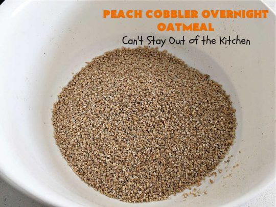 Peach Cobbler Overnight Oatmeal | Can't Stay Out of the Kitchen | this fantastic #oatmeal #recipe cooks in the #SlowCooker overnight. So easy & terrific for a company or #holiday #breakfast. Fresh, canned or frozen #peaches can be used. #vegan #GlutenFree #crockpot #OatMilk #SteelCutOats #OvernightOatmeal #PeachCobbler #PeachCobblerOvernightOatmeal