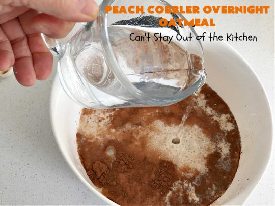 Peach Cobbler Overnight Oatmeal | Can't Stay Out of the Kitchen | this fantastic #oatmeal #recipe cooks in the #SlowCooker overnight. So easy & terrific for a company or #holiday #breakfast. Fresh, canned or frozen #peaches can be used. #vegan #GlutenFree #crockpot #OatMilk #SteelCutOats #OvernightOatmeal #PeachCobbler #PeachCobblerOvernightOatmeal