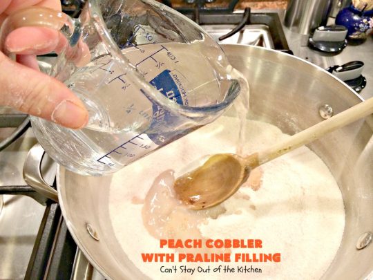 Peach Cobbler with Praline Filling | Can't Stay Out of the Kitchen | this luscious #peach #cobbler has #praline pie crust rolls on top. Absolutely divine! Perfect #dessert for summer.